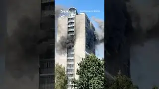 Fire breaks out at 17 storey towerblock with huge cloud of smoke filling sky