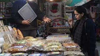 Colorful snack and textile stalls attract shoppers at Nature Bazaar, New Delhi