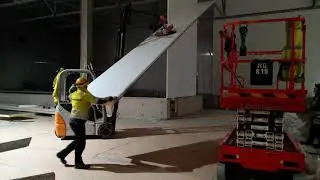 Installation of a laminate panel that is 10 meters in height in Atria&rsquo;s factory expansion