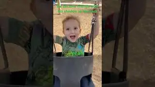 Playing on the swings, he wants me to push the empty swing because his shadow is swinging too!