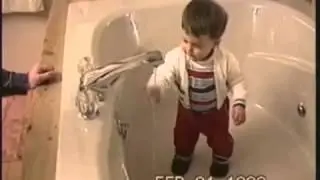 Home video reveals toddler's fascination with water faucet