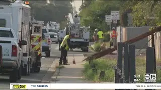 Semi-truck knocks down power poles in neighborhood near 36th Avenue and Butler