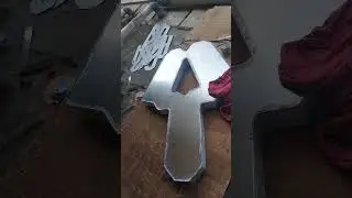 Contoh logo toilet dari stainless hairline