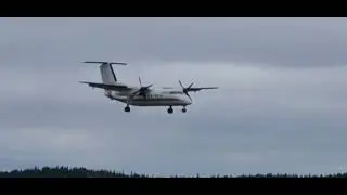 de Havilland Canada Dash 8-102 operated by Wasaya Airways landing in Big Trout Lake Airport (desc)