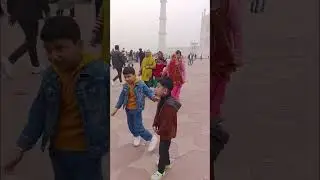  First holiday stop at Taj Mahal, family smiles, timeless beauty, history into forever memories.