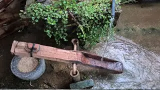 rice mill uses water power to create rice grains p3