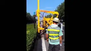 Highway guardrail drilling pile driver