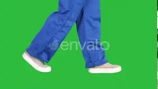 Legs of woman construction worker walking on a Green Screen | Stock Footage - Videohive