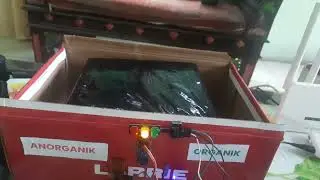 Pemilah sampah organik dan anorganik otomatis berbasis AI dan IoT