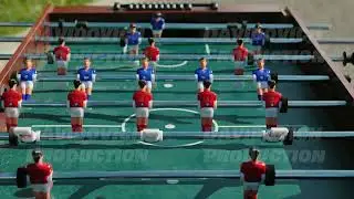 Table football game with red and blue players during a sports day