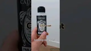 Applying clear coat to the guitar body