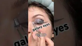 galaxy eyes using sparkly eyeshadow, rhinestones and graphic liner!✨