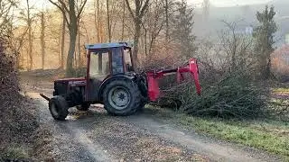 Brender Hiasl - mit der Holzzange