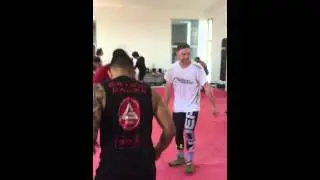 Penetration step. Coach Otto coaching Ronnie Mann MMA Increased Performance Summer Wrestling Camp.