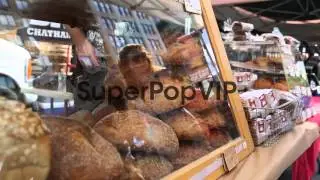 Tracking Shot, customer buying bread. Shoppers visit the ...