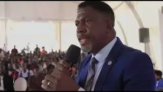 Hon Balimwezo being prayed for by Pr Wilson Bugembe 