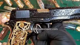 Colt 1911 fully engraved, royal blued, & 24k Gold plated accent.