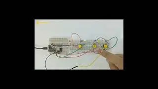 #light  #up  three #leds  #connected  to #esp32  #using  the #push  #button #shorts
