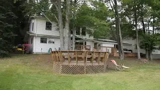 Lake Fifteen Atlanta, MI Home For Sale 10255 Lakeview Drive 49709