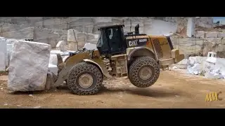 Caterpillar 980M Wheel Loader Working Hard On Marble Quarries