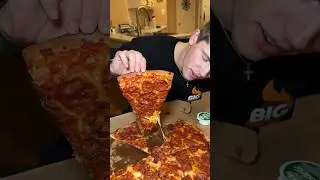 Eating a Shaquille o'neal pizza and doing a cheese pull test!