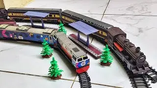 Vintage London Trains Running with Modern Commuter Line Trains / Miniature Trains