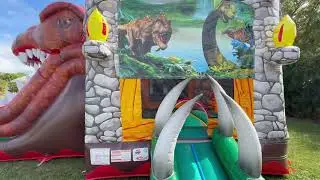 T REX bounce house with slides