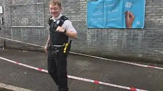Police officers cordoned part of co op in tyler street Greenwich where crime scene in place