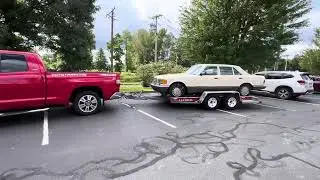 @DoingStuffOfficial Taking home a 1987 Mercedes Benz 300SDL Diesel with a UHaul trailer.