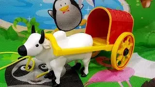 Распакуйте и играйте с забавной игрушкой для малышей &laquo;Тачка для волов&raquo;