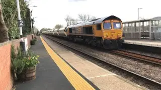 66788 Locomotion 15 with 17 covered sand wagons 13:21 20E 19/3/2024