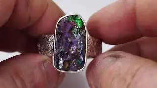 Striking large statement opal ring.