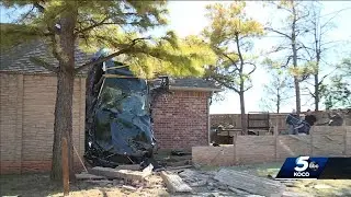 Car lands on OKC home&rsquo;s roof during crash