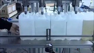 Tabletop Gravity Filler | Semi-Automatic Liquid Gravity Filling Machine - APACKS