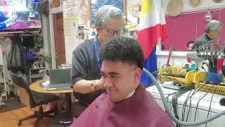 Short, low tapered haircut