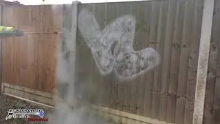 Graffiti removal from a timber fence