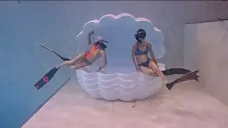 Freediving Girls Dive to a Plastic Giant Shell Together