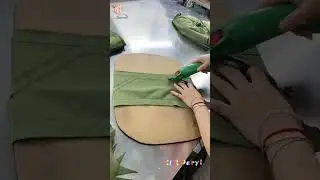 Cut the green cloth into underwear with electric scissors