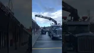 Unit #1168 (43 ton Knuckle Boom) Offloading Material and Equipment