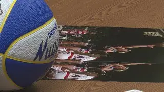 Former Nuggets star signs autographs during NBA Finals