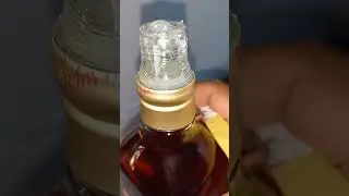como destapar una botella de wisky red label al estilo salvadoreño