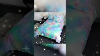 Pink yellow blue colorful rainbow bedding set is shiny.