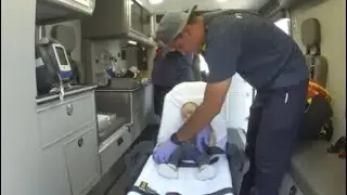 Police officer performs CPR on unresponsive baby