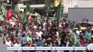 آلاف الفلسطينيين يشيعون جثماني 