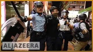 Police and protesters scuffle in Hong Kong after peaceful march