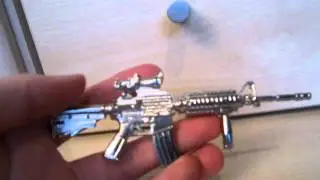 Resident Evil / Biohazard 3 rare Carlos mini metal assault rifle, promotional merchandise