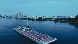 Chasing a tugboat in the river with my DJI MINI 3