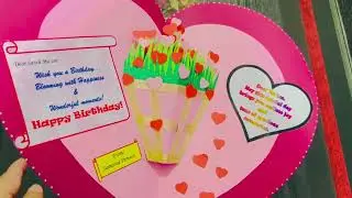 Heart shaped birthday card with flowers