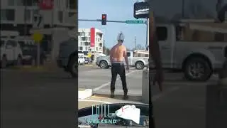 Shirtless dude dancing on the corner of Glenstone & Battlefield in Missouri.