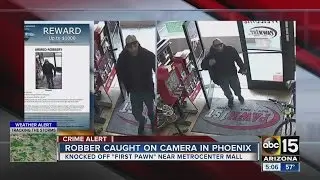 Pawn shop robber caught on camera near Metro Center Mall